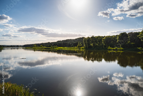 A riverside landscape along the Bug River with the setting sun