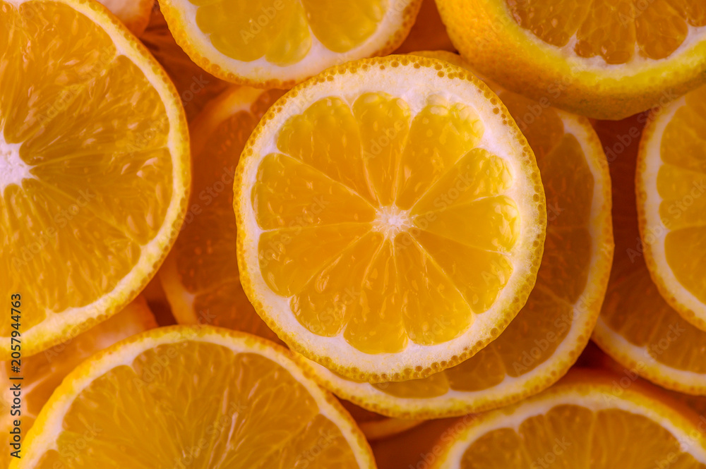 Fototapeta premium Freshly sliced oranges reveal vibrant colors and juicy textures perfect for summer days