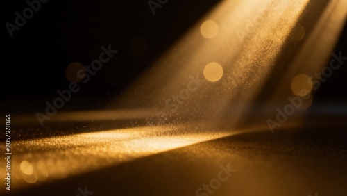 Golden light beams on reflective surface
