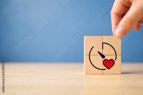 Soft skills and emotional intelligence in business leadership. Wooden blocks with heart and gauge icons, symbolizing soft skills, empathy, emotional intelligence and balanced business performance. 