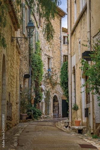Old stone houses on a street in medieval Saint Paul de Vence, South of France