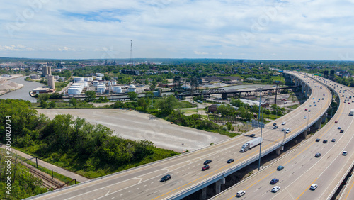 Aerial shot of cars driving on the highway in downtown Cleveland Ohio USA