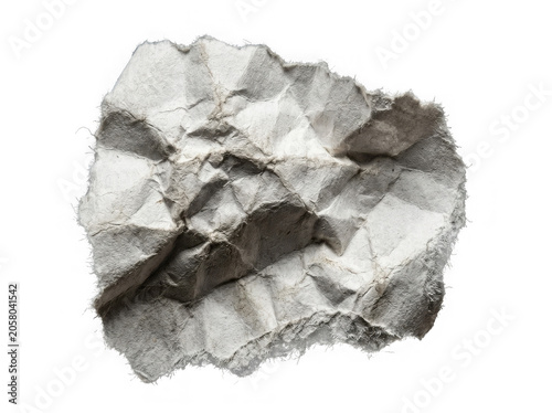 Close-up of rough, textured rock formation with natural shadows