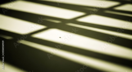 Abstract shadows from window frame creating geometric patterns and light effects