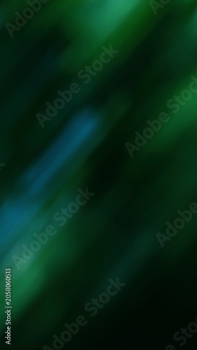 Abstract blurred green and blue streaks creating a vibrant dynamic background for creative design