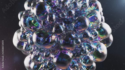 Floating iridescent 3D spheres representing science and innovation.