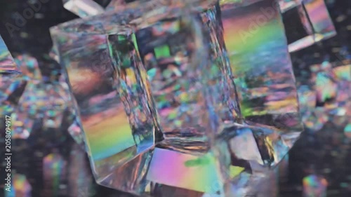 Iridescent glass cubes floating in dark abstract space