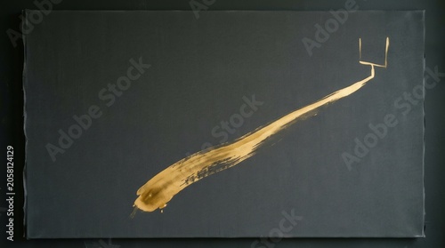 Abstract Art with Bold Golden Brushstroke on Dark Canvas Background