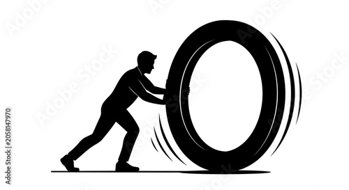 Man Pushing Large Rolling Tire.