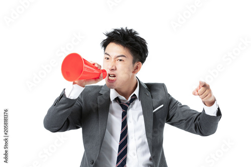 Canvastavla Angry businessman shouting through megaphone and pointing forward