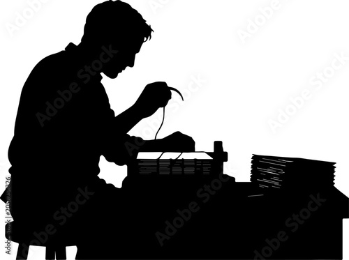 Obraz na płótnie Silhouette of a Craftsman Bookbinder Working at a Workbench with Specialized Too