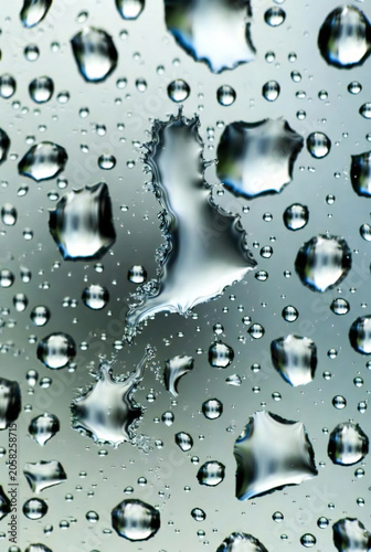 Extreme close-up of water droplets on glass, hyper-real texture, macro photography 