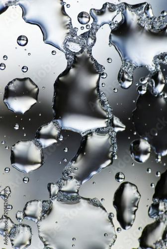 Extreme close-up of water droplets on glass, hyper-real texture, macro photography 
