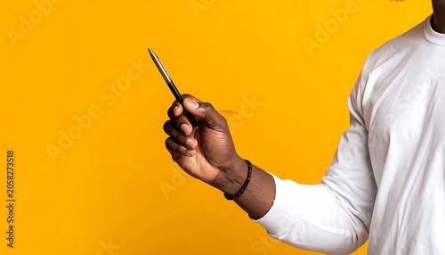 Hand holding a pen