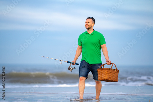 Obraz na plátne Summer fishing on sunny beach