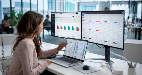 Картината върху платно Financial Analyst Woman Using Laptop