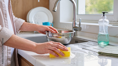 Photos Wiping kitchen surfaces, Washing dishes in the sink, Kitchen cleaning routine, H