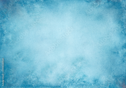 Abstract cerulean and royal blue watercolor backdrop with glowing center copy space