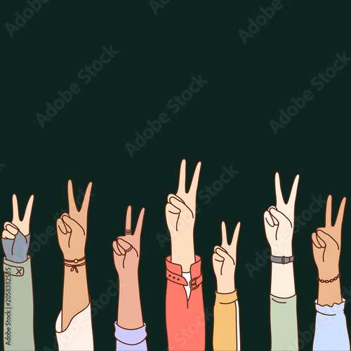 A group of diverse hands held up, displaying the peace sign. The image symbolizes unity and harmony