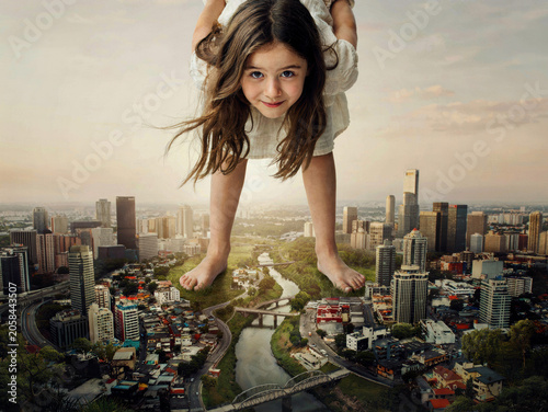 Giant young girl standing over a modern cityscape, surreal concept of scale and imagination. Generative AI.