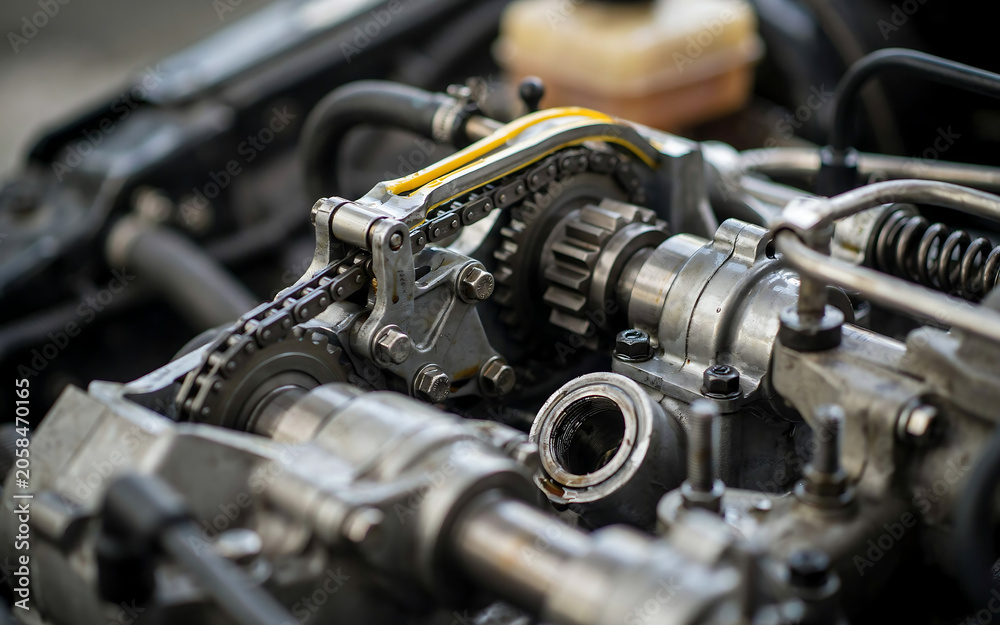 Fototapeta premium Close-up mechanical gear assembly in industrial machinery with metal parts and texture