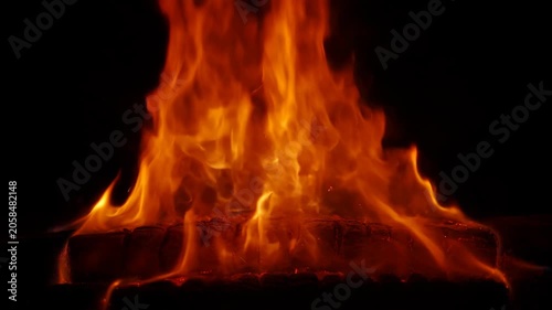 Fire flame burning ember heat smoke glow from blazing wood and hot log with ash and inferno sparks for dramatic SEO video title