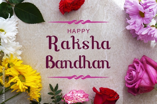 Fotografía happy raksha bandhan. congratulations with fresh flowers.