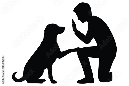 Bild auf Leinwand Vector silhouette of a man kneeling and training his obedient dog