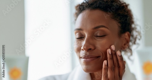 Woman enjoying skincare routine at home