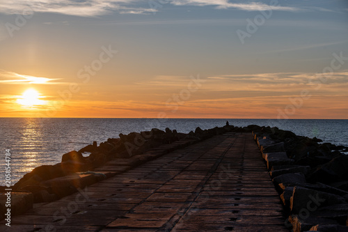 A figure in solitude at Sunset