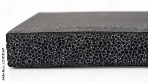 Cross-section view of a neoprene sample revealing its internal foam honeycomb structure.