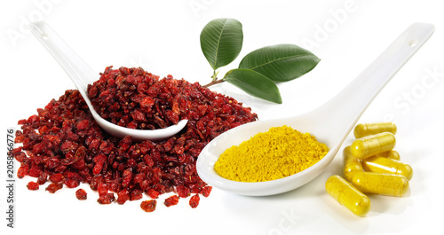 Dried Barberries and Berberin with Caps on white Background Isolated