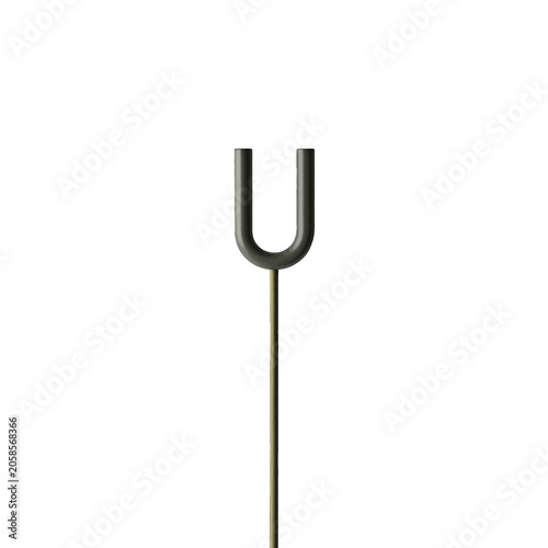 Billede på lærred A metallic tuning fork stands against a plain background