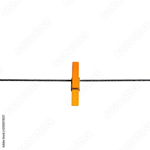 Konstfotografi A single orange clothespin grips a taut wire against a white background