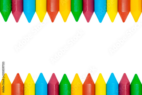 Canvastavla Horizontal top and bottom border frame of colorful wax crayons isolated on clean