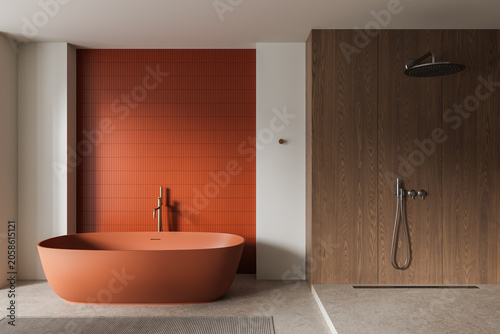 Foto Modern interior design bathroom with orange tub, tiled accent wall, wood shower area, soft lighting, and minimalist layout creating a serene contemporary atmosphere