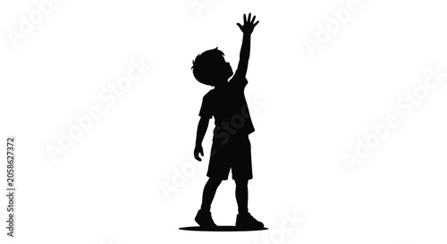 Foto Boy reaching up with arm raised a black silhouette against a white background si