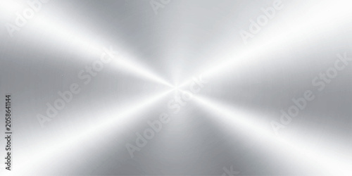 Fotografía A gleaming brushed metal surface with a radial starburst pattern, reflecting light and creating a sense of depth and modern sophistication