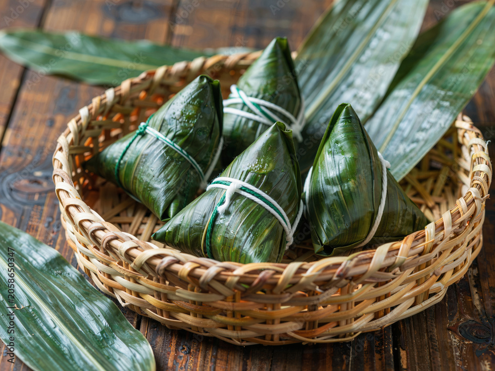Obraz premium Fresh Zongzi in a Bamboo Basket