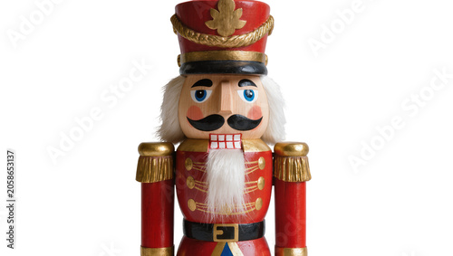 Cuadro en lienzo Traditional wooden nutcracker soldier with red uniform and gold trim, isolated o