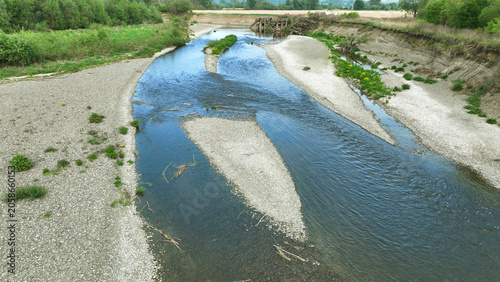 River drought wetland, swamp Becva drone aerial pond drying up very meander the soil cracked stream crust earth climate change, environmental disaster and earth cracks very, death for plants and