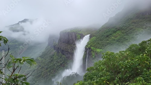 Timelapse of moving clouds and waterfall in western ghats of India.