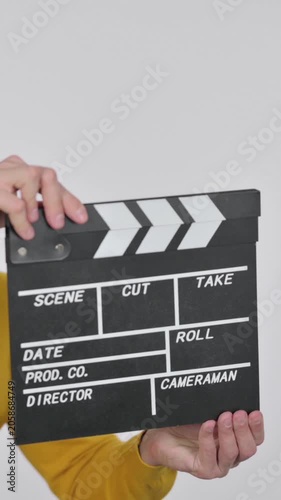 Portrait of Middle Aged Man Using clapperboard, Vertical Video