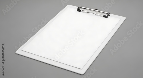 Blank White Clipboard Resting on Gray Studio Surface