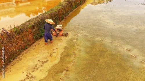 Farmers use tillers to plow, transplant rice seedlings, and fertilize in the fields.