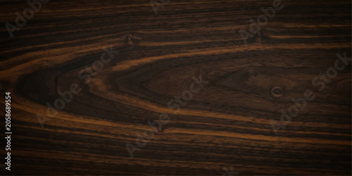 Foto Rich, dark ebony wood grain texture with swirling patterns and natural knots