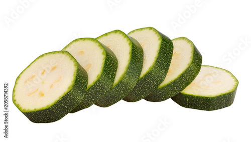 Tableau sur toile Sliced zucchini rounds with green skin and white flesh