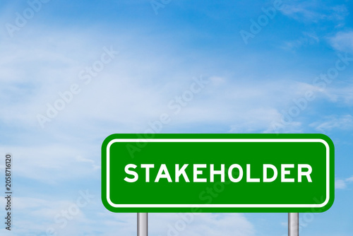 Green color transportation sign with word stakeholder on blue sky with white cloud background