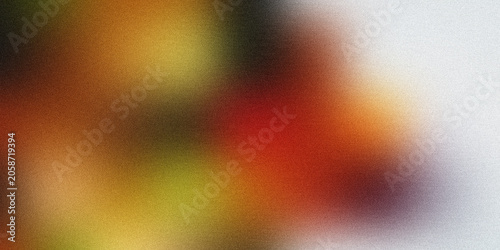 Vibrant abstract blend of red, orange, yellow, and green with grainy texture keywords: abstract
