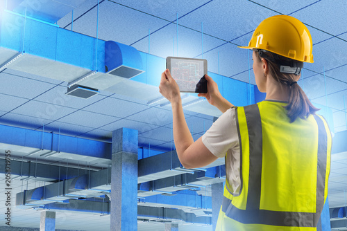 HVAC inspection, Female eng...
